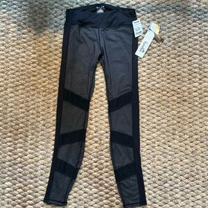 Kyodon yoga pants with mesh cut outs NEW WITH TAGS